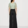 Anna FieldOverall / Jumpsuit - Light Green/black -Wal C Stil Butik 366535e3fb074a4fb45da0c39687f595